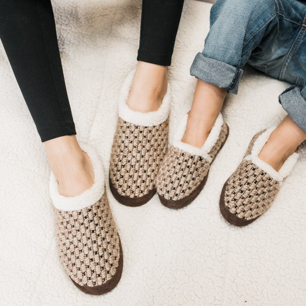 Women's Jam Mule Slippers on figure relaxing on bed with child