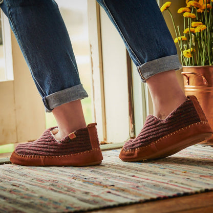 Women's Recycled Camden Moccasins in walnut on figure headed outdoors#color_walnut